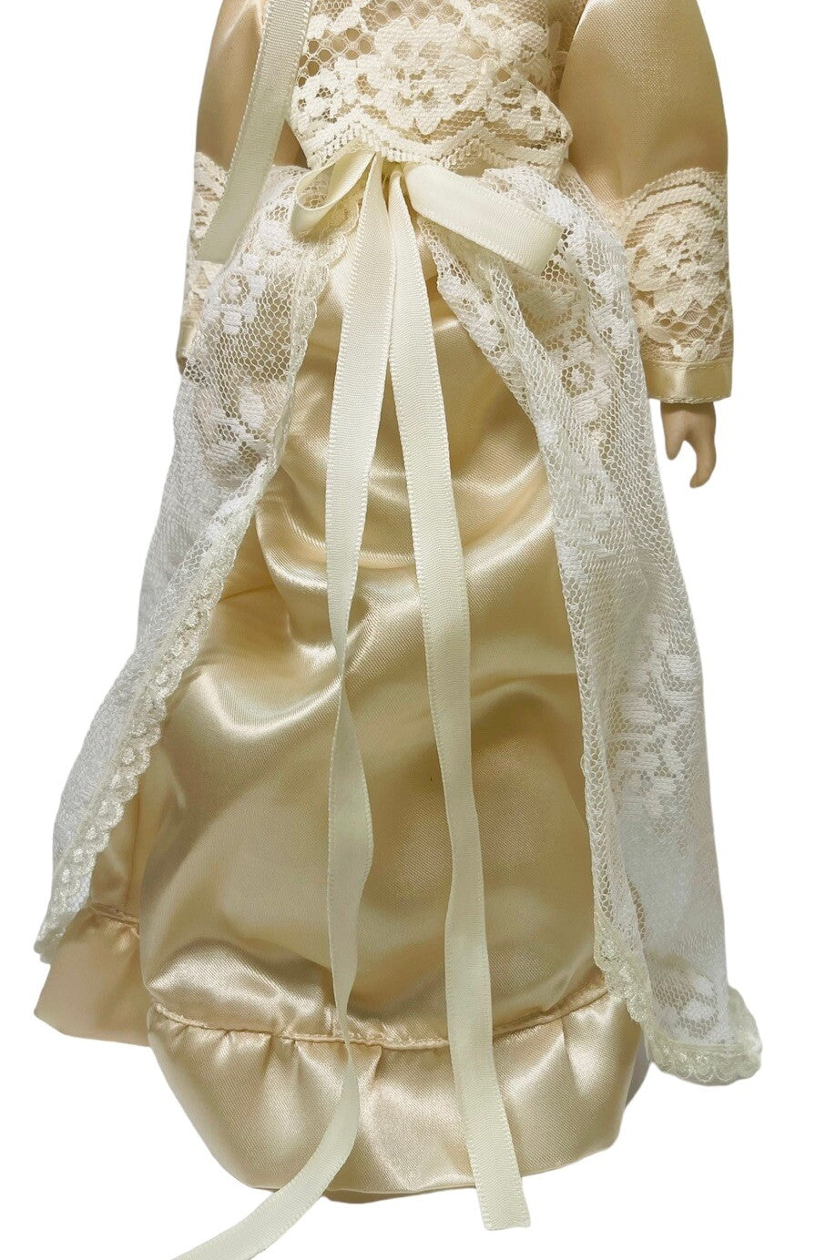 PORCELAIN DOLL 14" WEARING CREAM LACE SATIN GOWN W/MATCHING LACE BONNET.