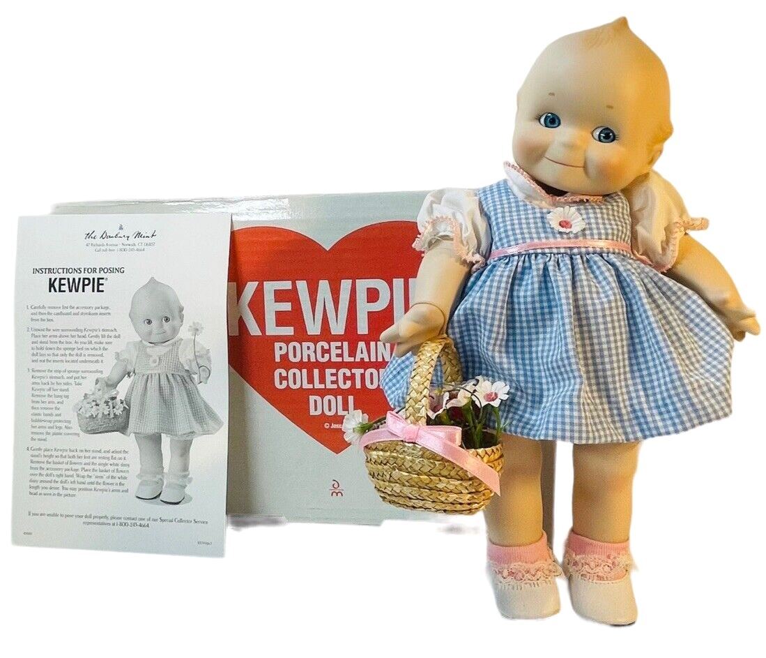 KEWPIE PORCELAIN DOLL 11” ©JESCO 1997 (100% PORCELAIN) W/ORIGINAL BOX/STAND