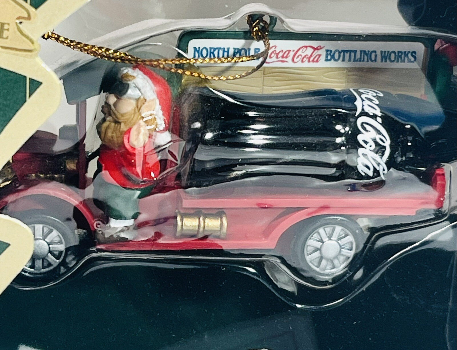 1997 Coca Cola Truck Ornament Holding a Bottle of Coke W/Santa's Ornament