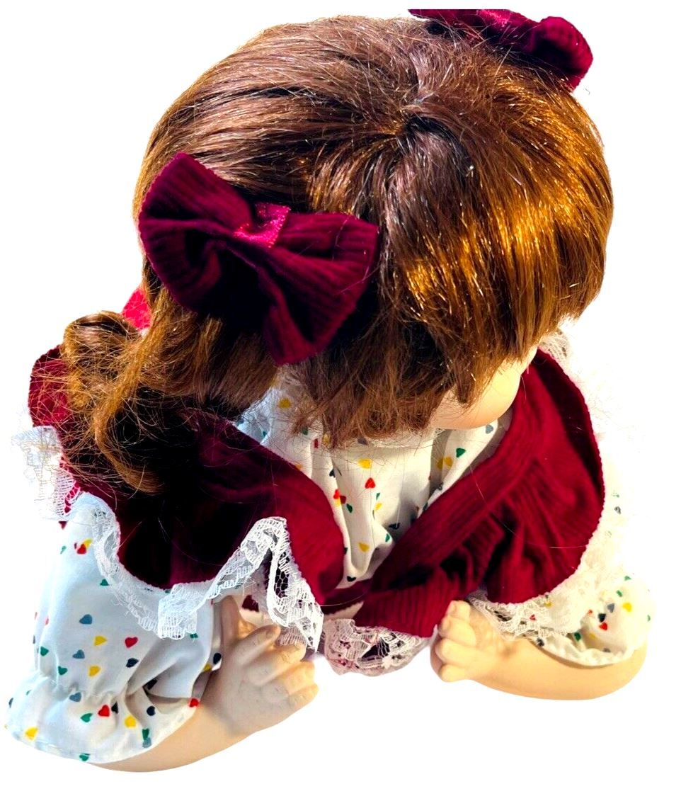 BEAUTIFUL PORCELAIN DOLL BRUNTTE~BROWN EYES L 20''XW 6''XH 10''~WT. 2.2 lbs.